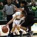 Saline junior Erik Jacobsen drives against a Saline defender on Friday, Jan. 4. Saline defeated Dexter 43-37. Daniel Brenner I AnnArbor.com